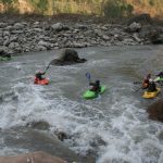 Kayaking Nepal Playing a wave