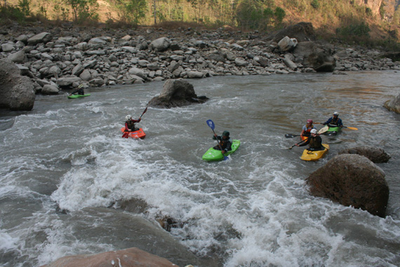 Kayaking Nepal Playing a wave